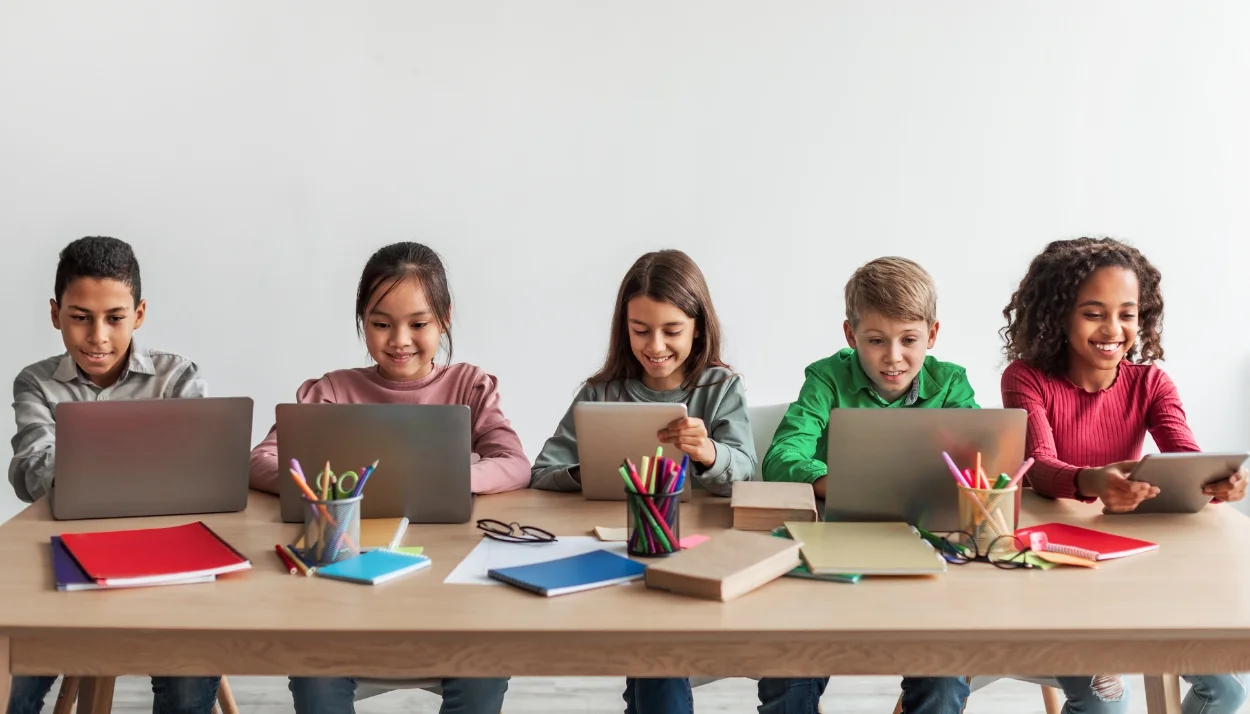 group of children with computers