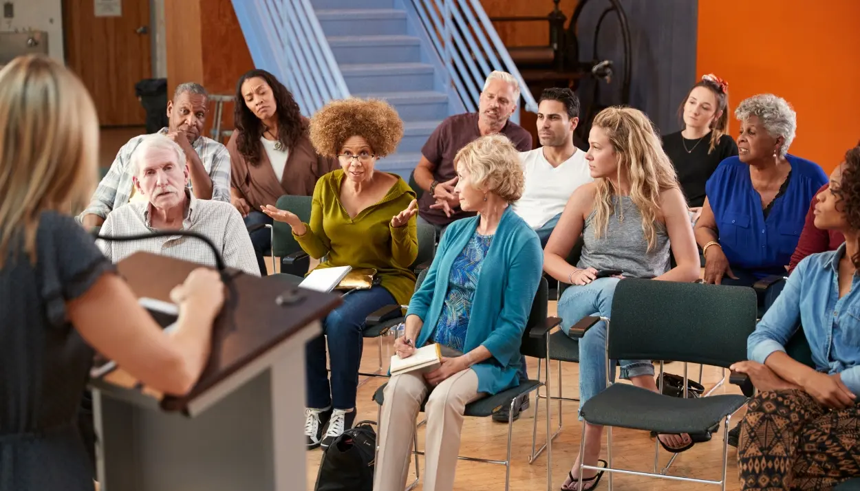 meeting room with people listening