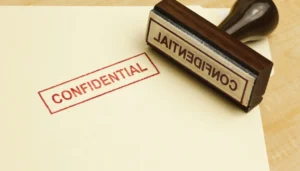 Paper stamp with the word "Confidential"